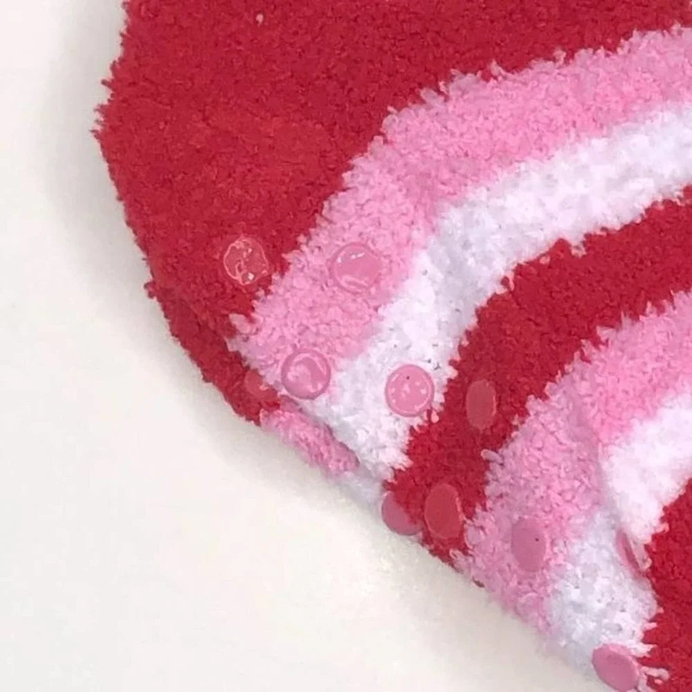 Max and Olivia Kids plush socks with gripping soles.